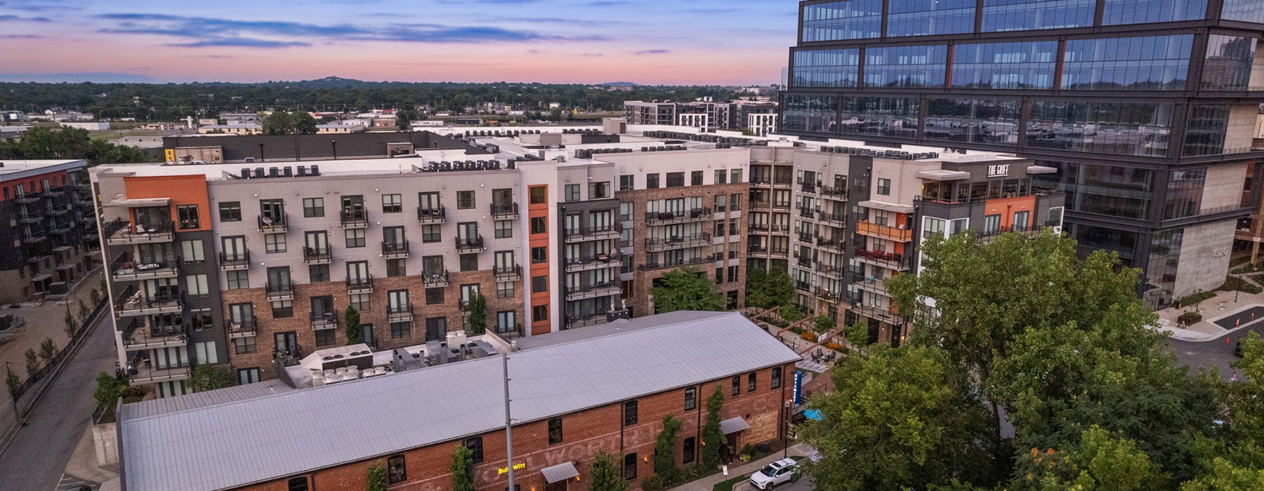 a large building at sunset